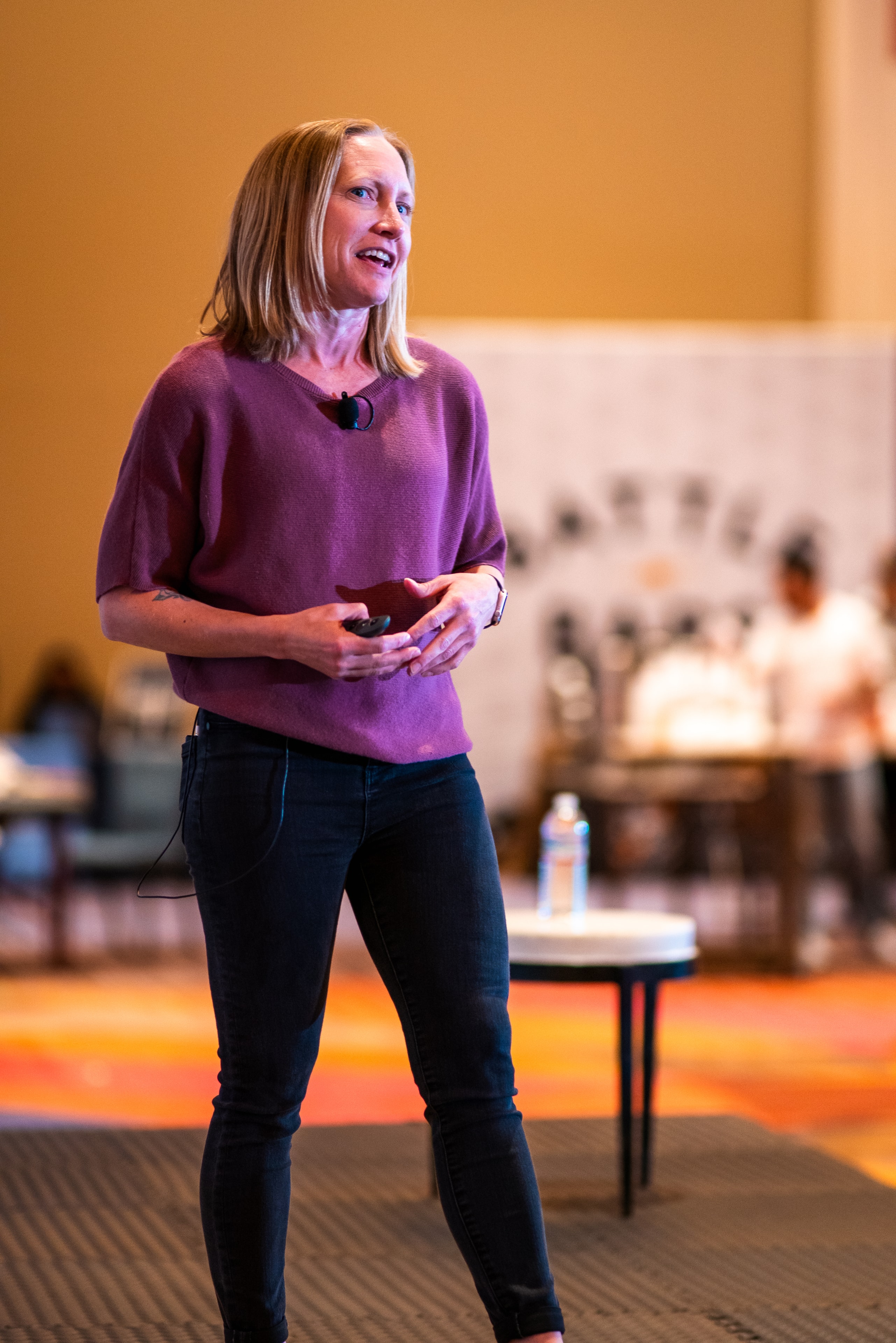 Joleen Bingham speaking on stage